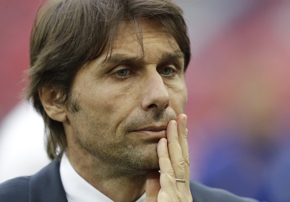 Chelsea team manager Antonio Conte leaves the pitch after his team lost the English FA Cup final soccer match between Arsenal and Chelsea at the Wembley stadium in London, Saturday, May 27, 2017. (AP  ...