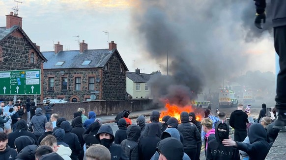 In this image taken from PA Video, people protest over an alleged sexual assault in the Co Antrim town of Ballymena, Northern Ireland, Tuesday, June 10, 2025. (Niall Carson/PA via AP)
Britain Northern ...