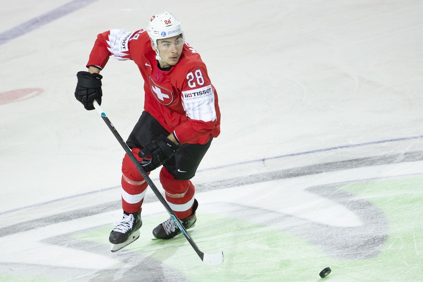 Switzerland&#039;s forward Timo Meier controls the puck, during the IIHF 2021 World Championship preliminary round game between Switzerland and Sweden, at the Olympic Sports Center, in Riga, Latvia, T ...