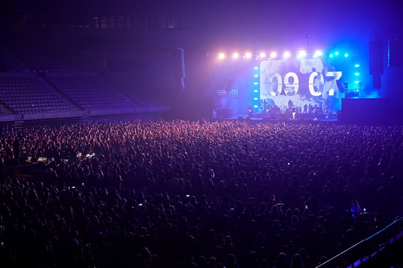 epa09101858 Spanish band Love of Lesbian performs on stage in front of 5,000 people at the Palau Sant Jordi arena in Barcelona, Catalonia, Spain, 27 March 2021. This is the first crowded concert in Sp ...