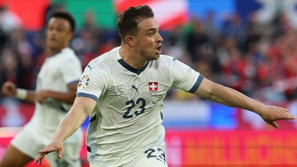 epa11423929 Xherdan Shaqiri of Switzerland celebrates scoring the equalizer during the UEFA EURO 2024 group A soccer match between Scotland and Switzerland, in Cologne, Germany, 19 June 2024. EPA/FRIE ...