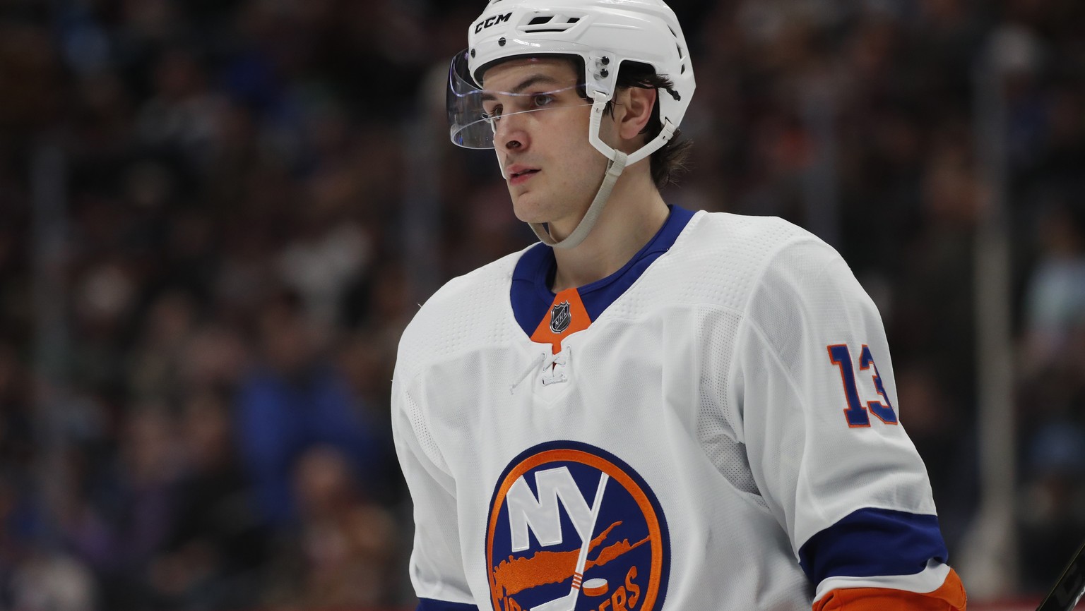 FILE - This Feb. 19, 2020 file photo shows New York Islanders center Mathew Barzal (13) during the second period of an NHL hockey game in Denver. Barzal has agreed to terms on a contract with the New ...