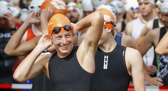 Nicola Spirig of Switzerland looks on before competing in the Zurich Triathlon (olympic distance) - a 5150 Series Event - in Zurich, Switzerland, Saturday, July 23, 2016. (KEYSTONE/Patrick B. Kraemer)