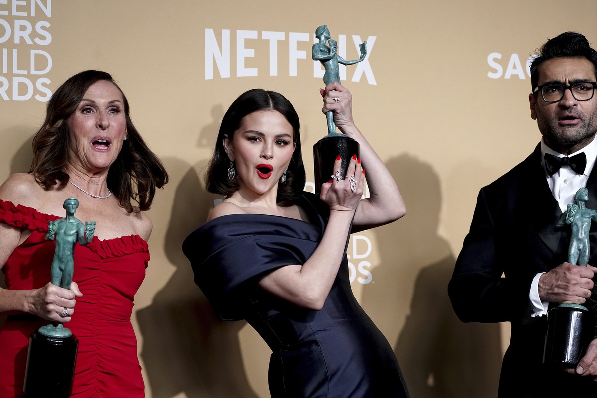 Molly Shannon, from left, Selena Gomez, and Kumail Nanjiani, winners of the award for outstanding performance by an ensemble in a comedy series for "Only Murders In The Building," pose in th ...