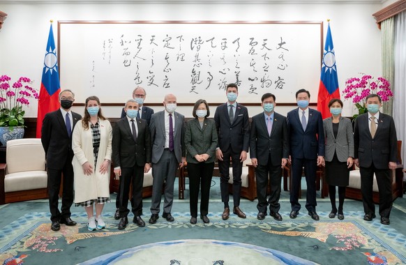 epa10450370 A handout photo made available by the Taiwanese Presidential Office shows Swiss politician Fabian Molina (CR) posing for a group photo with Taiwanese President Tsai Ing-wen (CL) during the…