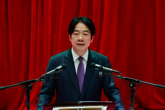 epa12344864 Taiwanese President William Lai (Lai Ching-te) speaks during a ceremony honoring officers and soldiers for their service ahead of Armed Forces Day in Taipei, Taiwan, 02 September 2025. The ...