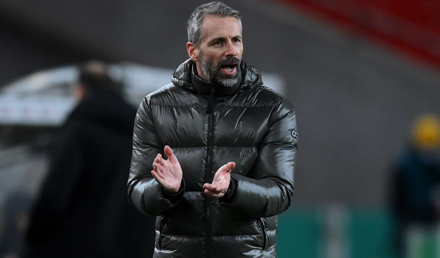 epa08985499 Marco Rose, Head Coach of Borussia Monchengladbach applauds during the DFB Cup Round of Sixteen match between VfB Stuttgart and Borussia Moenchengladbach at Mercedes-Benz Arena in Stuttgar ...