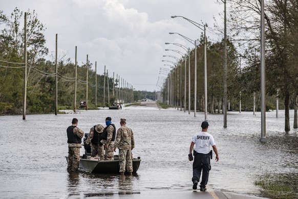 epaselect epa09437675 Members of the Louisiana National Guard and local sheriffs department work on search and rescue missions related to flooding from Hurricane Ida in Jean Lafitte, Louisiana, USA, 3 ...