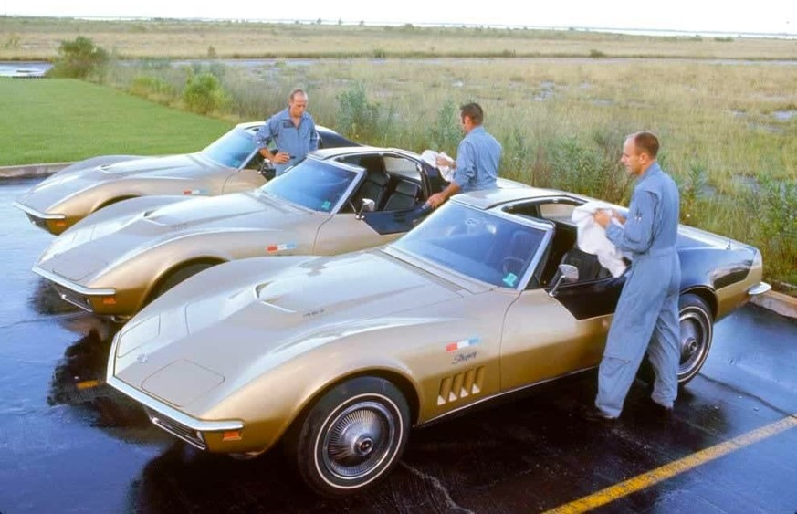 The Apollo 12 crew and their Corvettes. 1969.