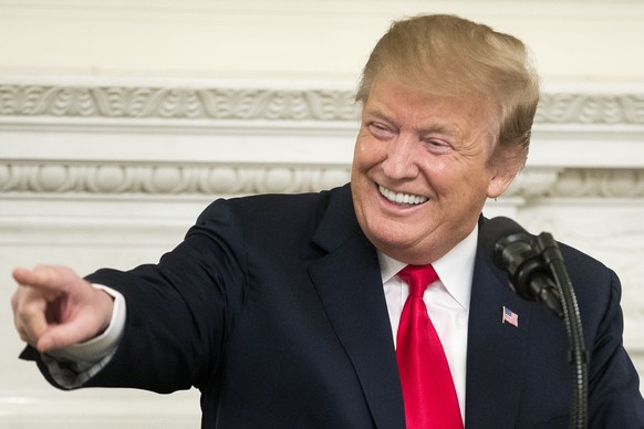 epa07413908 US President Donald J. Trump delivers remarks at an event for the National Association of Attorneys General, in the State Dining Room of the White House in Washington, DC, USA, 04 March 20 ...