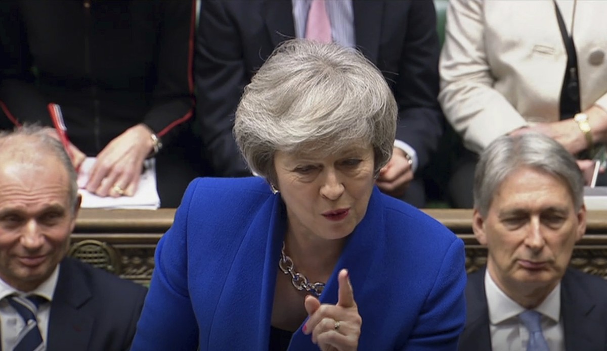 Britain's Prime Minister Theresa May speaks during Prime Minister's Questions in the House of Commons, London, Wednesday Jan. 16, 2019. In a historic defeat for the government Tuesday, Brita ...