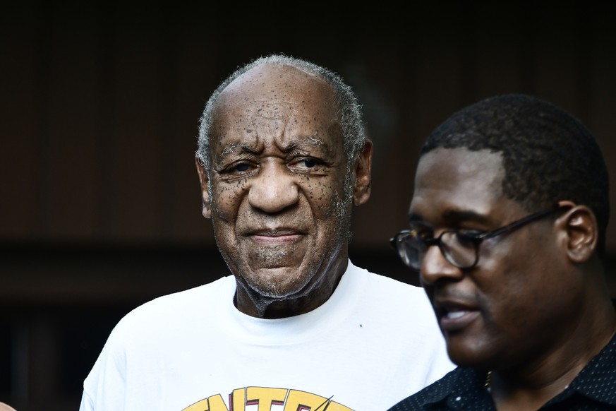 epa09314358 US actor Bill Cosby (L) appears in front of the media after he arrived home following the Pennsylvania Supreme Court&#039;s ruling throwing out Cosby&#039;s sexual assault conviction which ...