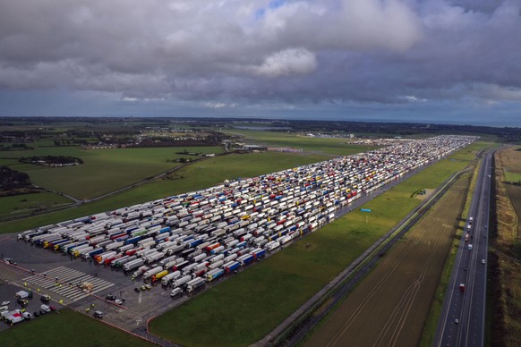 Freight lorries lined up in Manston, after French authorities announced that journeys from the UK will be allowed to resume after the coronavirus ban was lifted, but those seeking to travel must have  ...