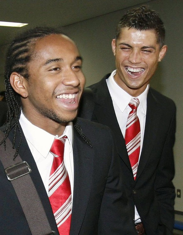 Manchester United's Cristiano Ronaldo, right, and Anderson arrive at New Tokyo International Airport in Narita, near Tokyo, Japan, Monday, Dec. 15, 2008. The club team will play in the FIFA Club  ...