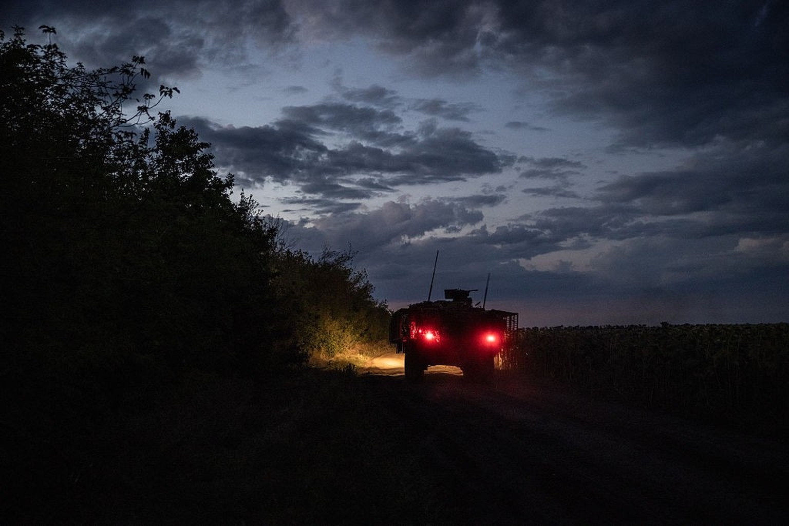 DONETSK, UKRAINE - AUGUST 14: Infantry soldiers from Ukraine&#039;s 82nd Brigade are taken to a front line position in an armoured vehicle from a tree line north of Pokrovsk on August 14th 2025, in Do ...