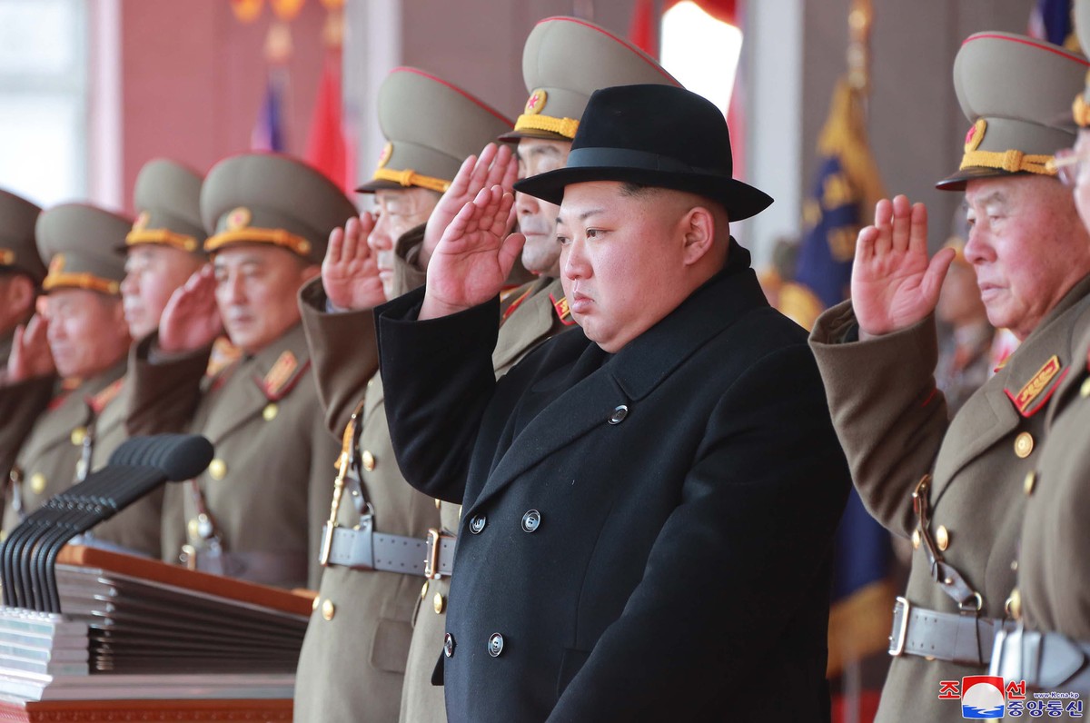 In this Thursday, Feb. 8, 2018, photo provided by the North Korean government, North Korean leader Kim Jong Un, second right, attends a military parade to mark the 70th anniversary of the founding of  ...