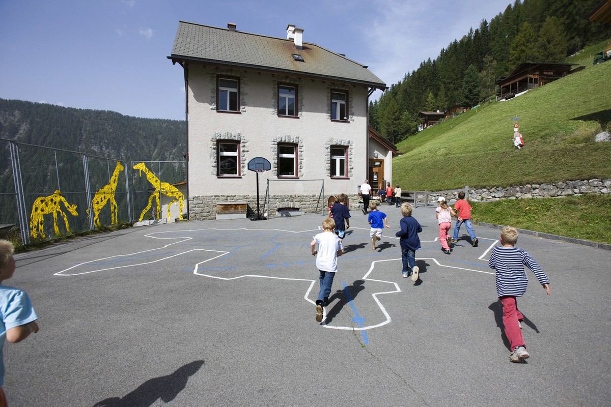 Pupils play soccer on the playground at the elementary school in Monstein near Davos in the canton of Grisons, Switzerland, pictured on September 11, 2008. The elementary school Davos Monstein is a co ...