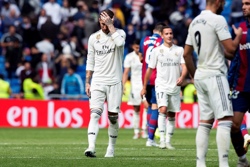 epa07106924 Real Madrid&#039;s Sergio Ramos (L) reacts after the Spanish La Liga soccer match between Real Madrd and Levante UD at Santiago Bernabeu stadium in Madrid, Spain, 20 October 2018. EPA/Rodr ...