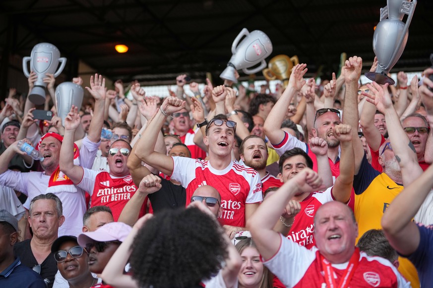 Arsenal supporters celebrate after the English Premier League soccer match between Crystal Palace and Arsenal in London, England, Sunday, May 24, 2026. (AP Photo/Kin Cheung)
Britain Premier League Soc ...