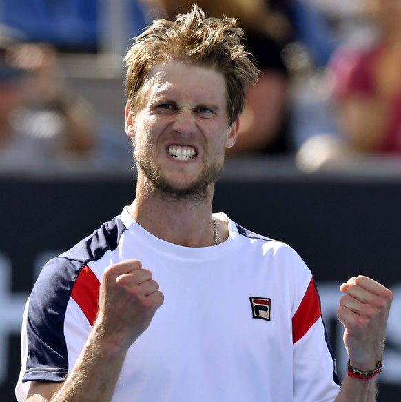Italy&#039;s Andreas Seppi celebrates after defeating Belgium&#039;s Steve Darcis during their third round match at the Australian Open tennis championships in Melbourne, Australia, Friday, Jan. 20, 2 ...