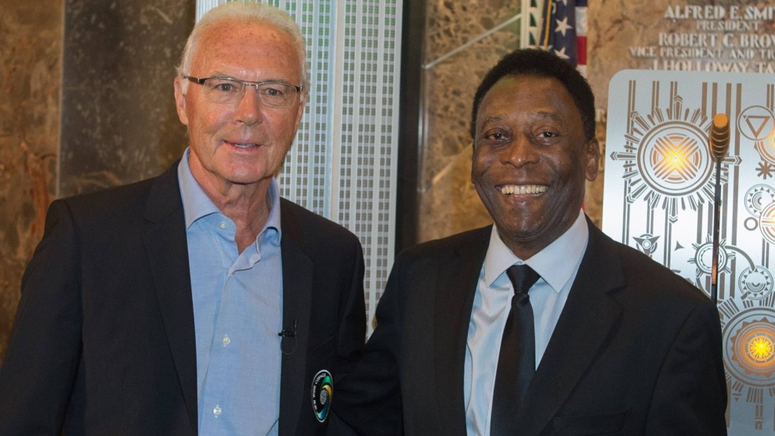 April 17, 2015 - Manhattan, New York, USA - The New York Cosmos Legends PELE and FRANZ BECKENBAUER light the Empire State Building Cosmos Green to launch and celebrate the start of the team s 2015 ope ...