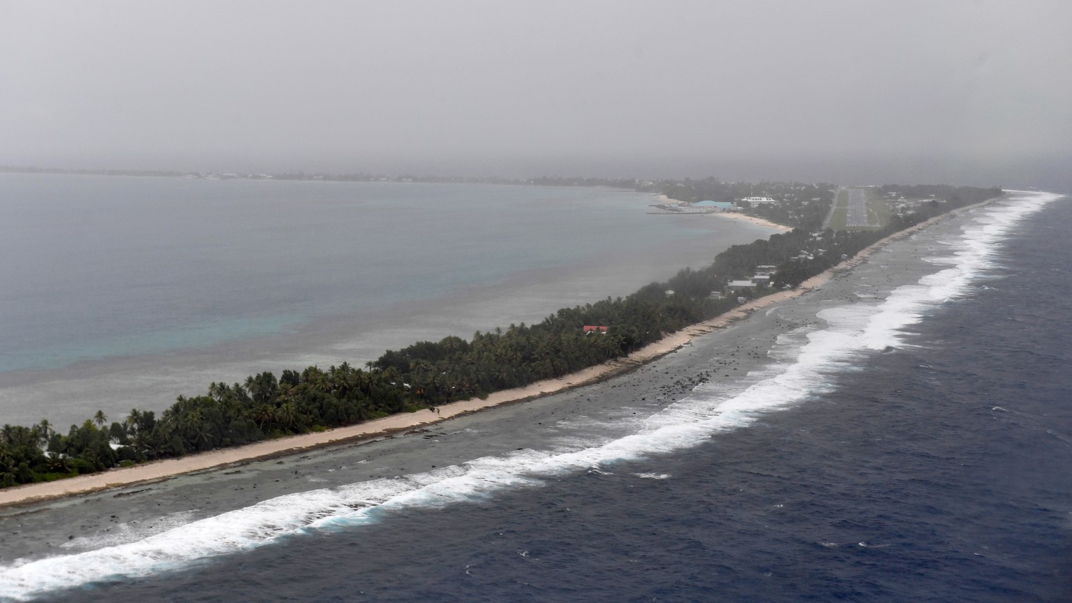 epa07770645 An aerial view of Funafuti, Tuvalu, 13 August 2019. The 50th Pacific Islands Forum (PIF) and Related Meetings, fostering cooperation between governments comprising 18 countries in the regi ...