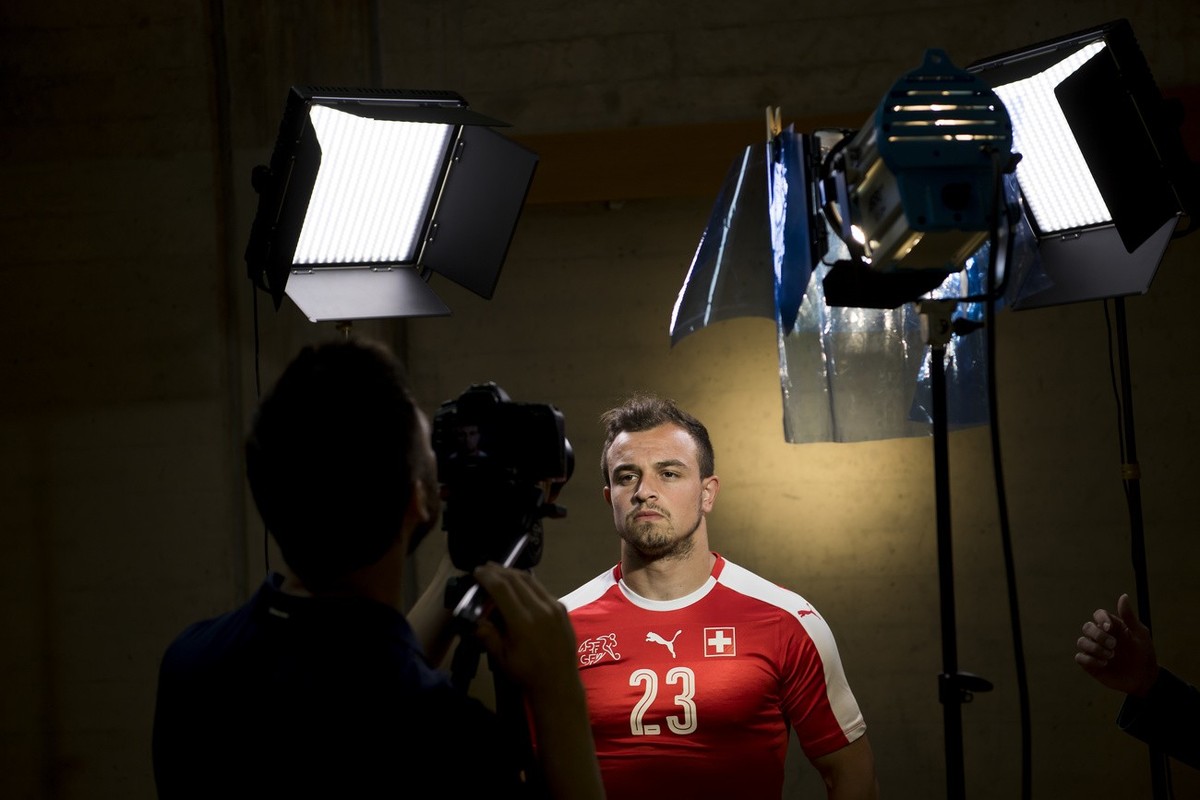 Swiss soccer player Xherdan Shaqiri reacts as he attends a Swiss national soccer team photo shoot, in Lugano, Switzerland, Wednesday, June 1, 2016. The Swiss national soccer team prepares for the UEFA ...