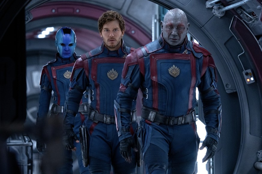 (L-R): Karen Gillan as Nebula, Chris Pratt as Peter Quill/Star-Lord, and Dave Bautista as Drax in Marvel Studios&#039; Guardians of the Galaxy Vol. 3. Photo by Jessica Miglio. © 2023 MARVEL.