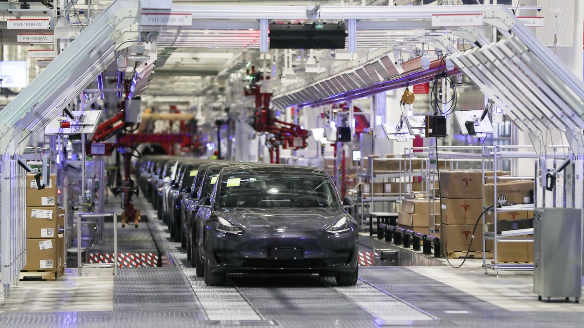 In this photo released by China's Xinhua News Agency, Tesla vehicles are seen on an assembly line at Tesla's gigafactory in Shanghai, Tuesday, Jan. 7, 2020. Tesla's Shanghai factory del ...