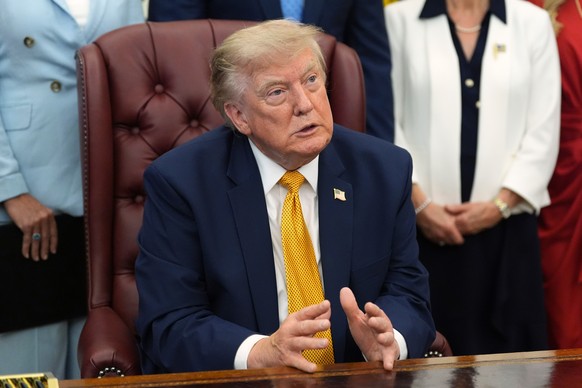President Donald Trump speaks during a meeting about military families, in the Oval Office of the White House, Monday, Aug. 3, 2026, in Washington. (AP Photo/Alex Brandon)
Donald Trump