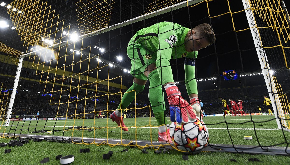 Young Boys' goalkeeper David von Ballmoos takes the ball after receive a goal 4-1 of Villareal's Samuel Chimerenka Chukwueze, during the UEFA Champions League group F soccer match between BS ...