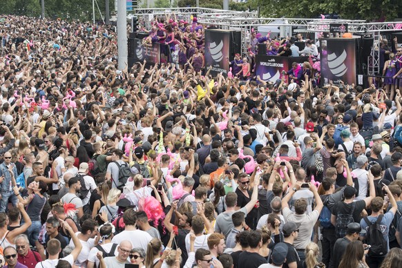 Fancy dressed participants of the annual technoparade &quot;StreetParade&quot; cheer in the city center of Zurich, Switzerland, Saturday, 12 August, 2017. (KEYSTONE/Ennio Leanza)