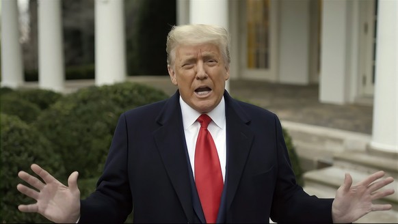 FILE - This exhibit from a video released by the House Select Committee shows President Donald Trump recording a video statement from the Rose Garden on the afternoon of January 6, shown during a hearing...
