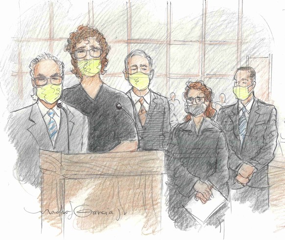 In this courtroom sketch, Patrick Crusius, second from left, appears in federal court accompanied by his legal team Joe Spencer, left, Mark Stevens, third from left, Rebecca Hudsmith, second from righ ...