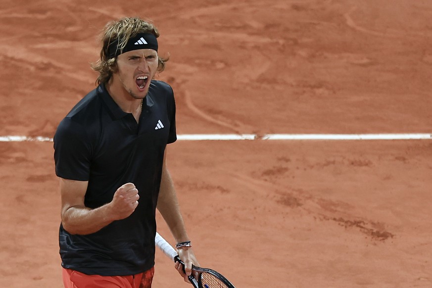 Germany&#039;s Alexander Zverev celebrates after winning the second set against Bulgaria&#039;s Grigor Dimitrov during their fourth round match of the French Open tennis tournament at the Roland Garro ...