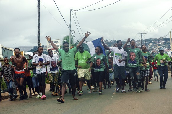 Supporters of President Julius Maada Bio celebrate in the streets of Freetown, Sierra Leone, after the electoral commission declared him the winner, Tuesday June 27, 2023. Sierra Leone&#039;s election ...