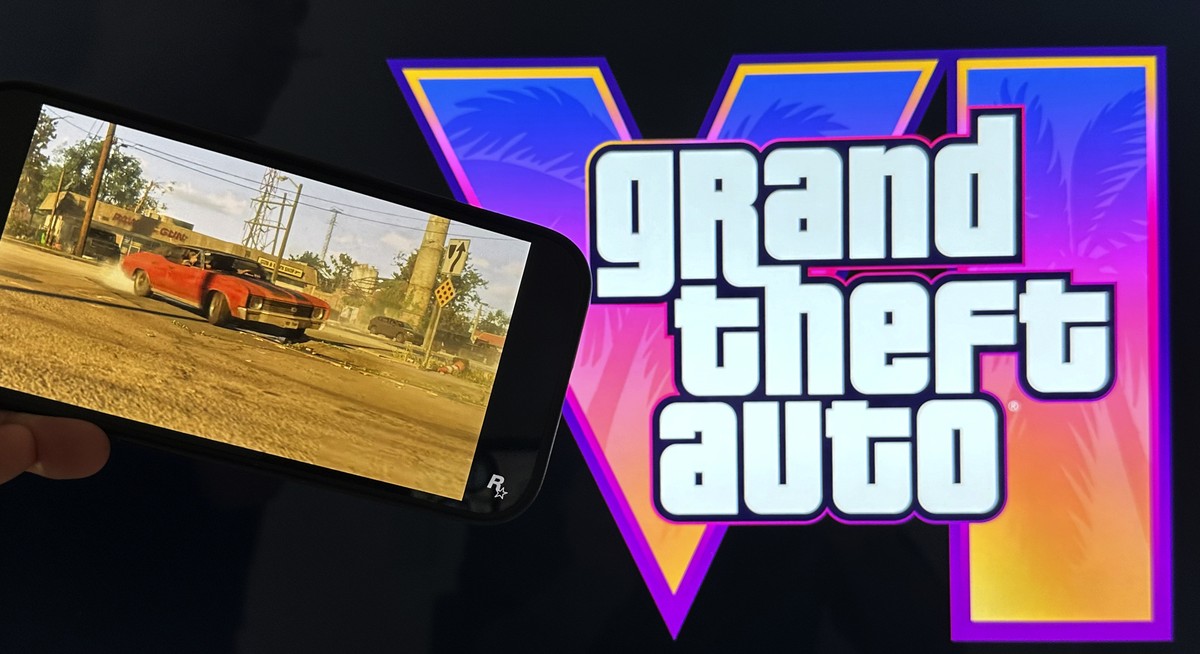 Scenes from the trailer of Grand Theft Auto VI are shown on a smartphone and monitor in New York on Tuesday, Dec. 5, 2023. The highly-anticipated trailer for Grand Theft Auto VI arrived a little early ...