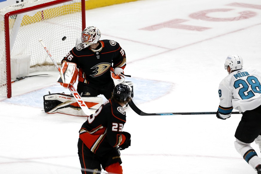 Anaheim Ducks goalie John Gibson (36) is unable to make a save on a goal scored by San Jose Sharks forward Timo Meier (28) during the third period of an NHL hockey game Friday, March 12, 2021, in Anah ...
