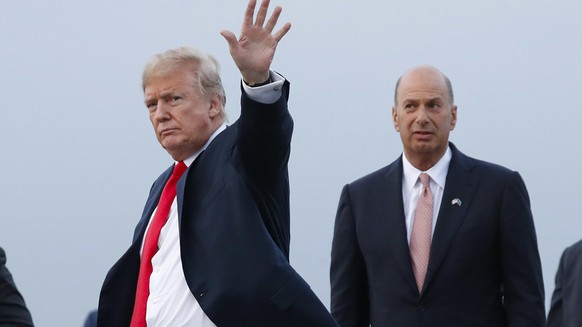 FILE - In this July 10, 2018, file photo, President Donald Trump is joined by Gordon Sondland, the U.S. ambassador to the European Union, second from right, as he arrives at Melsbroek Air Base, in Bru ...