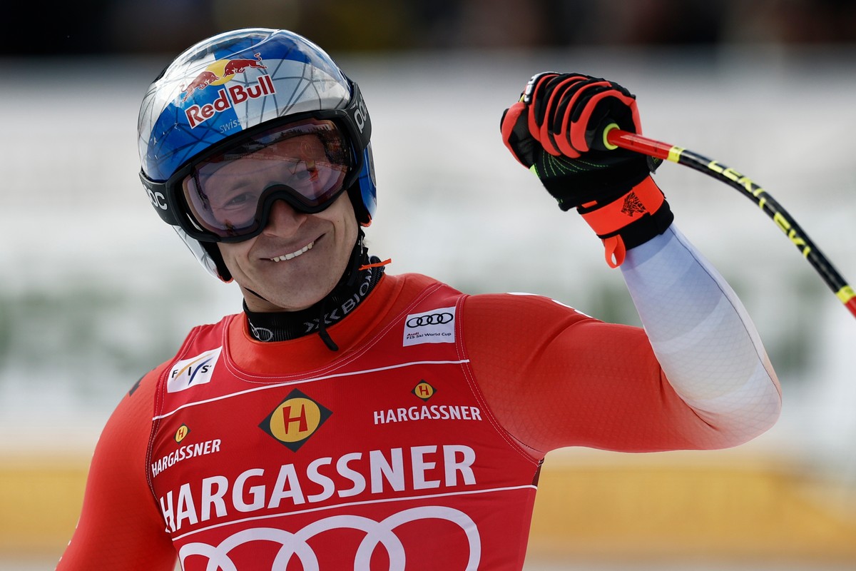 Switzerland's Marco Odermatt celebrates at the finish area of an alpine ski, men's World Cup downhill, in Val Gardena, Italy, Thursday, Dec. 18, 2025. (AP Photo/Gabriele Facciotti)
Italy Wor ...