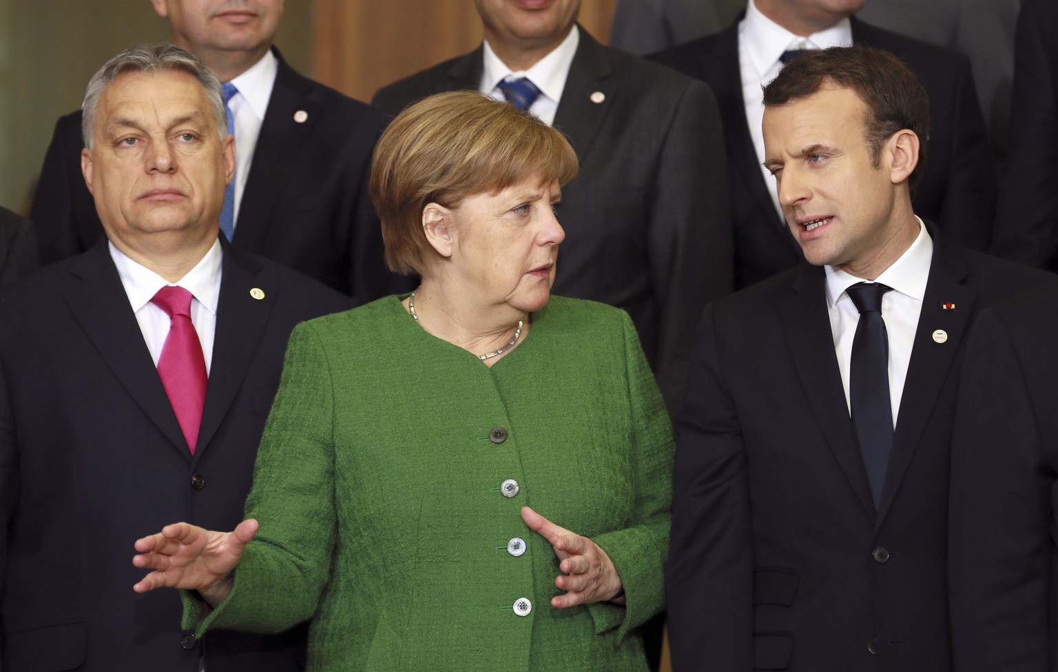 German Chancellor Angela Merkel, center front, poses for a group photo during an EU-Sahel meeting at EU headquarters in Brussels on Friday, Feb. 23, 2018. European Union leaders meet Friday with count ...