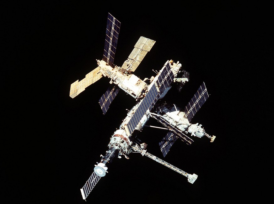 In this June 1998 handout picture from NASA, Russia&#039;s Mir space station is photographed during the final fly-around of the Space Shuttle Discovery before docking. The Mir space station&#039;s 15- ...