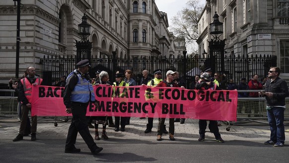Extinction Rebellion demonstrators outside Downing Street on the last day of the environmental action group&#039;s four days of action called &quot;The Big One&quot;, in London, Monday April 24, 2023. ...