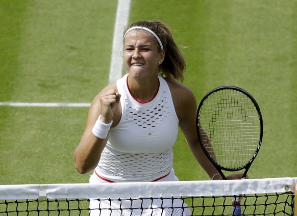 Czech Republic's Karolina Muchova celebrates winning a point against Czech Republic's Karolina Pliskova in a women's singles match during day seven of the Wimbledon Tennis Championships ...
