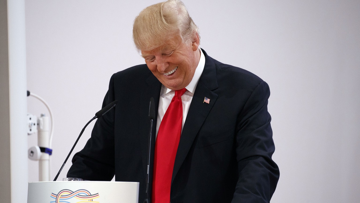 President Donald Trump laughs as he speaks to the Women&#039;s Entrepreneurship Finance event at the G20 Summit, in Hamburg, Germany, Saturday, July 8, 2017. (AP Photo/Evan Vucci)