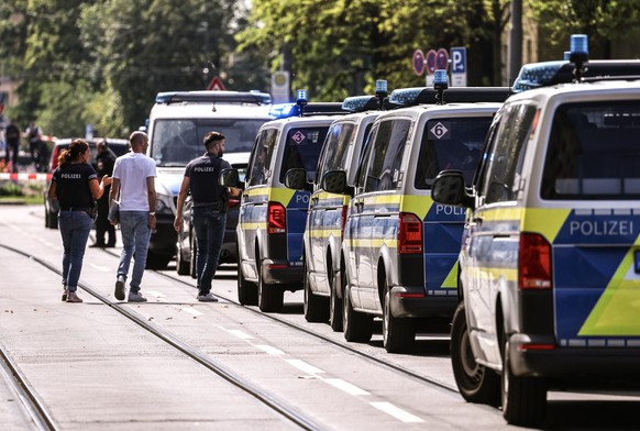 epa11586574 Police officers secure the area after a shooting near the NS Documentation Center for the History of National Socialism building in Munich, Germany, 05 September 2024. German police office ...