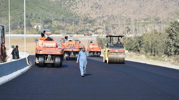 In this Dec. 22, 2017, photo, work in progress at the site of Pakistan China Silk Road in Haripur, Pakistan. From Pakistan to Tanzania to Hungary, projects under Chinese President Xi Jinping&#039;s si ...