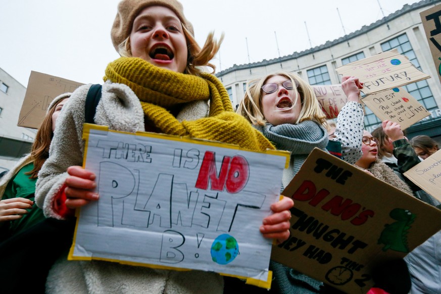 epa07314891 Belgian students gather to call for urgent measures to combat climate change during a demonstration in Brussels, Belgium, 24 January 2019. According the police more than 35,000 students ar ...