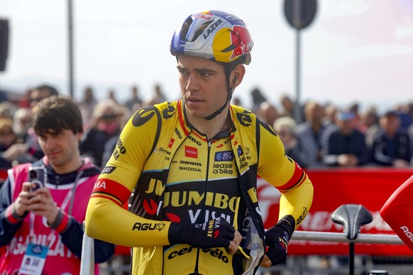 epa10508942 Rider Wout Van Aert of team Jumbo - Visma before the start of the 3rd stage of the Tirreno Adriatico cycling race, from Follonica to Foligno, in Follonica, Italy, 08 March 2023. EPA/ROBERT ...