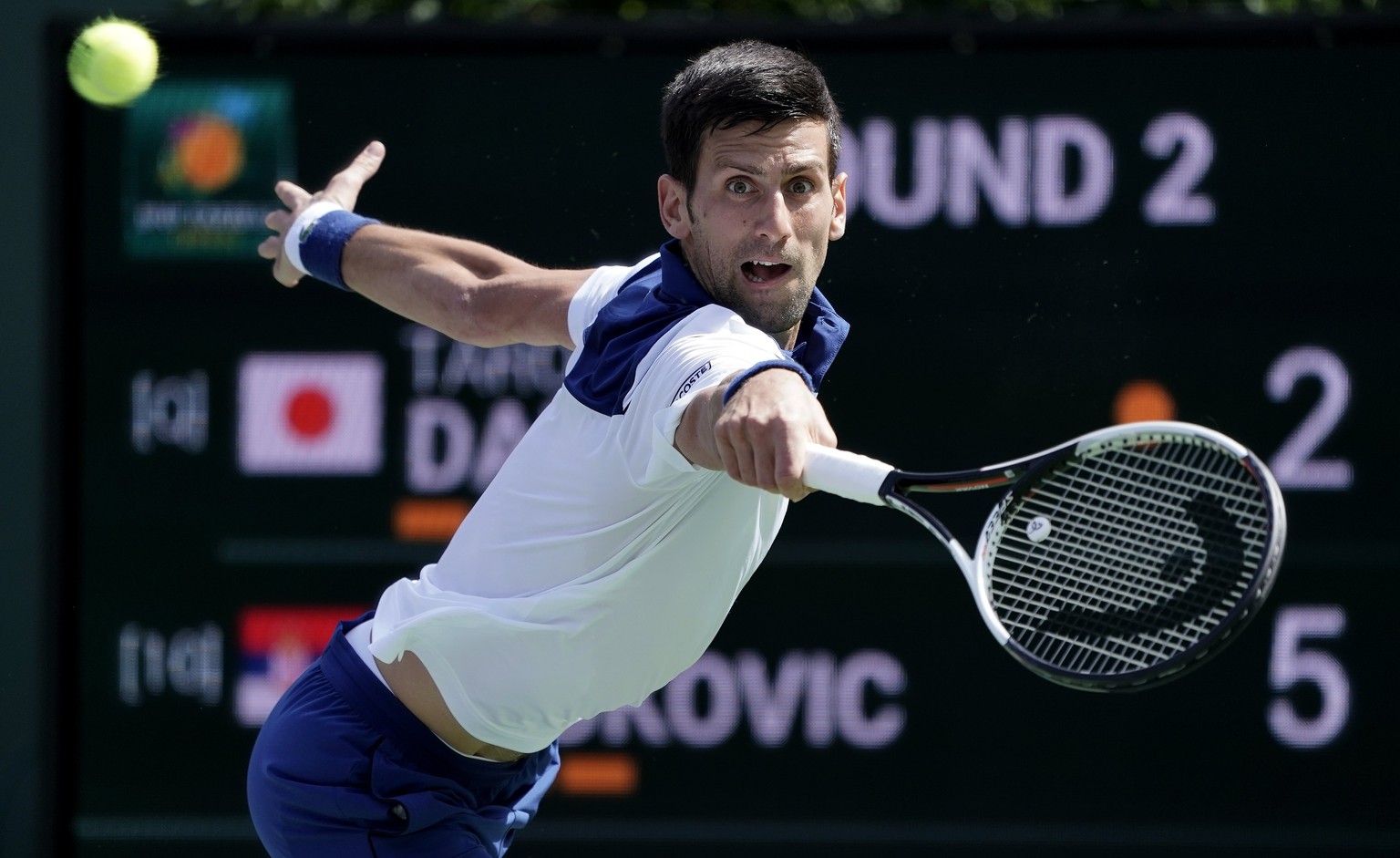 epa06597167 Novak Djokovic of Serbia in action against Taro Daniel of Japan during the BNP Paribas Open at the Indian Wells Tennis Garden in Indian Wells, California, USA,11 March 2018. EPA/JOHN G. MA ...